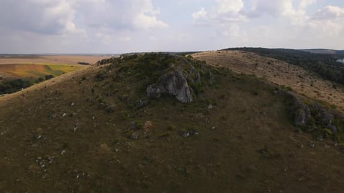 Aerial View on Rocky Hill Drone Flies Forwards Over Stony Landscape
