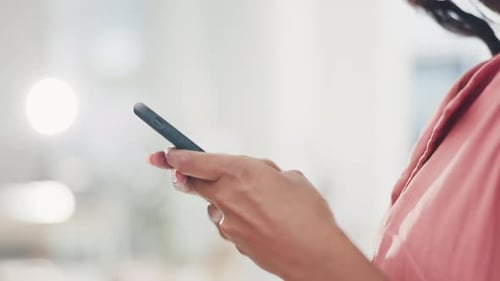 Woman, hands and phone typing in communication for social media, browsing or search in workshop