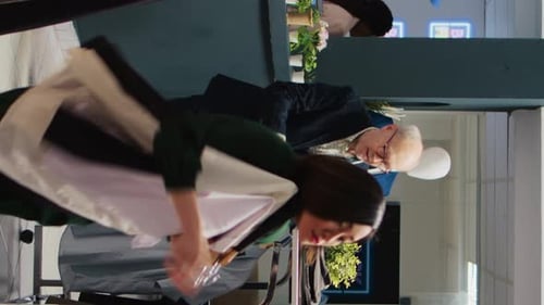 Customers and Employees Inside of a Clothing Store