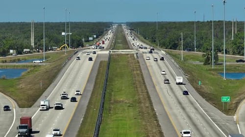 Top View of Mulitlane American Highway with Rapid Driving Cars During Rush Hour in Florida View From