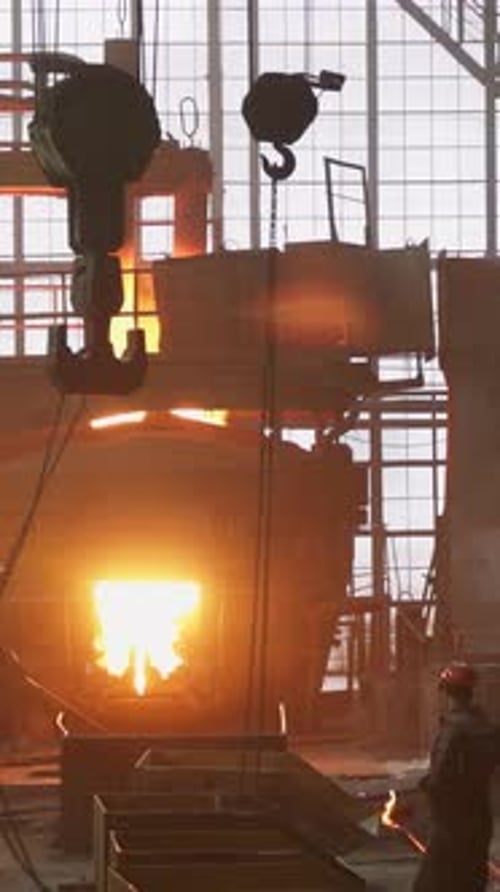 The Production of Industrial Steel is Carried Out in a High Tech Foundry Facility Stock Clip
