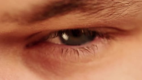 Closeup View Of A Young Man's Eye Keep On Blinking - Close up shot