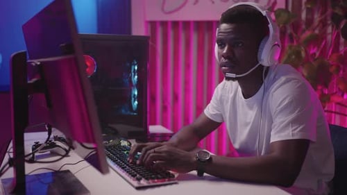 Pro Gamer Man Streaming And Playing Game Online Gameplay Stream Portrait Of African American Man