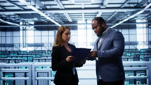 Team of Admin in Server Hub Checking Recovery Plan Monitoring Data Center