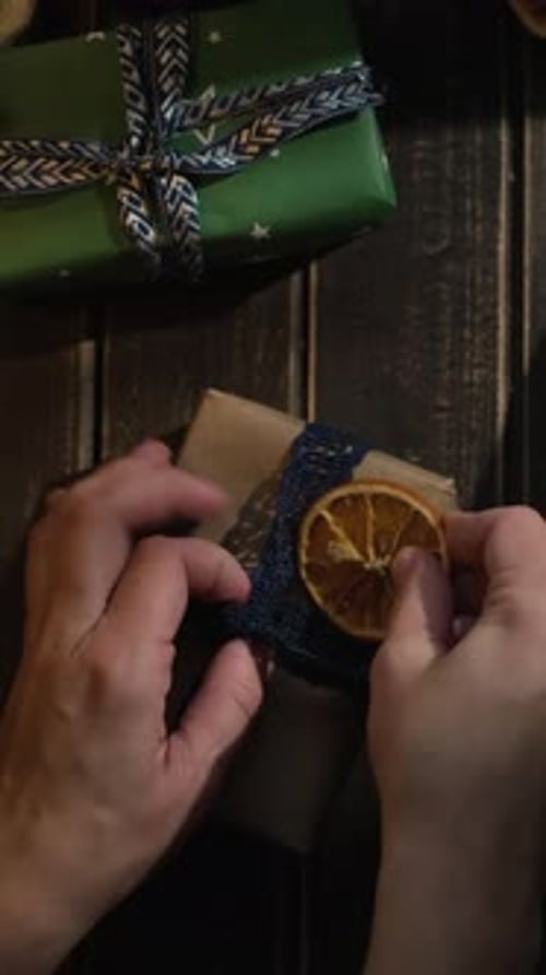 Vertical Video Person Preparing Presents for Christmas Holiday Season