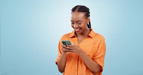 Woman, laugh and typing with phone in studio to update social media post