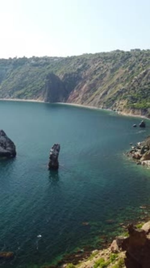 Aerial Vertical View of Seascape with Crystal Clear Azure Sea and Rocky Shores A Beautiful Lagoon on