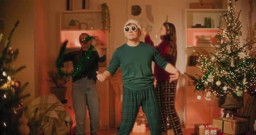 Friends Celebrate Christmas by Dancing at Home