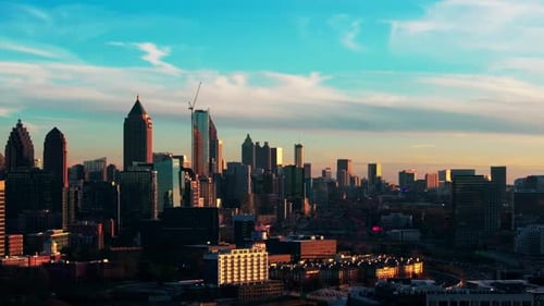 Panning shot of Atlanta Midtown with traffic.