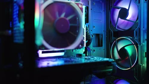 Futuristic Computer with Neon RGB Fans Rotating