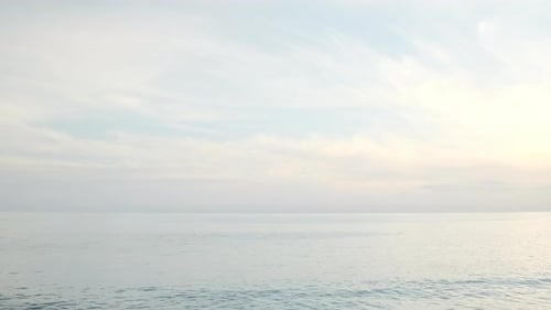 Heavenly partially cloudy skies on the Big Rock beach of Malibu California at golden hour