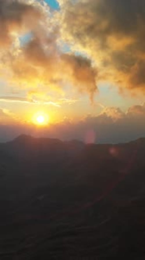 Sunset mountains and dramatic clouds