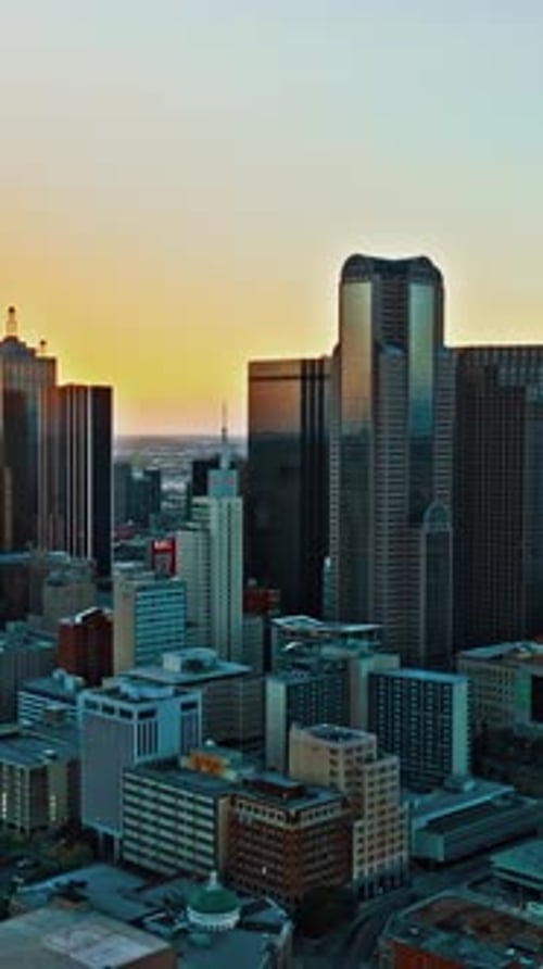 Sunset over downtown Dallas showcasing urban skyline and buildings