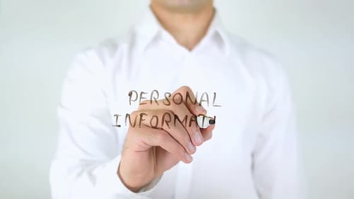 Man Writes Personal Information on Clear Surface