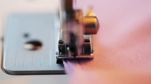 Needlework and Tailoring Concept - Sewing Machine Presser Foot Stitching Fabric Bespoke