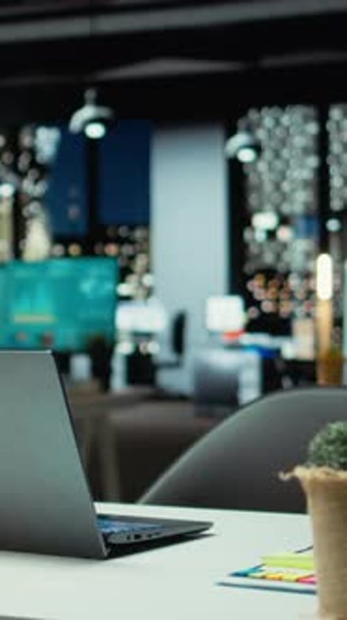Vertical Video Empty Business Office at Night Showcasing Data Reports and Analytics