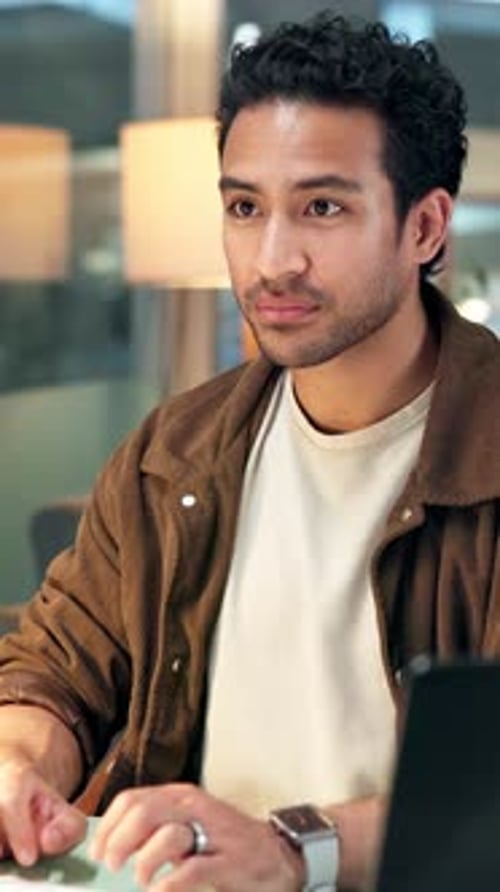 Creative, man and typing in office for research, proofreading and editor feedback for draft