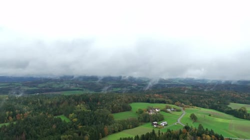 Foggy Landscape With Village And Forests During Autumn - Aerial Shot