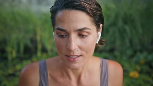 Closeup Earphones Sportswoman Talking at Green Park Woman Face Calling Online