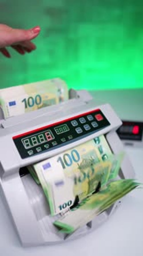 Machine Counting One Hundred Euro Currency