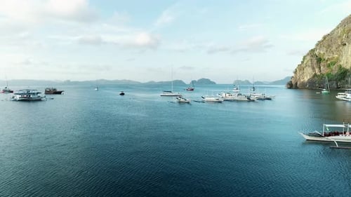 Aerial Drone View of Boats Anchored in the Bay with Clear and Turquoise Water Boat and Yacht in the