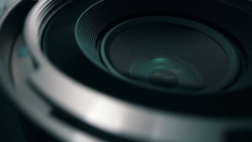 Detailed View of DSLR Camera Lens with Reflections