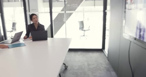 Diverse Group of People Attending a Business Meeting