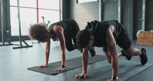 Fitness, mountain climber or people in gym training or exercising in body workout for core strength