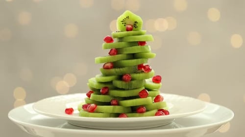 Festive Christmas Tree Made from Kiwi and Pomegranate