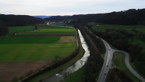 Flying through highway with moving cars in Germany