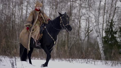 Beautiful Noblewoman with Arrow Sitting on Horse Portrait in Winter Historical Reconstruction