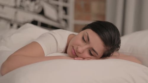 Woman Sleeping Peacefully in Bed Close Up