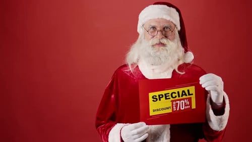 Smiling Santa Claus Holding Special Discount Sign