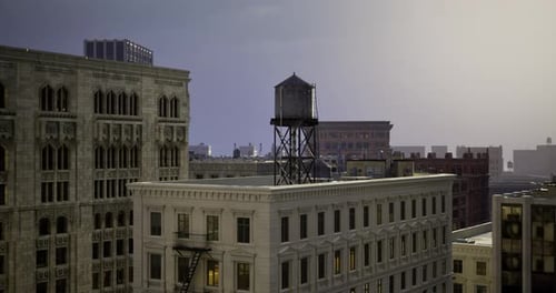 Skyline View with an Iconic Water Tower During Twilight in an Urban Setting