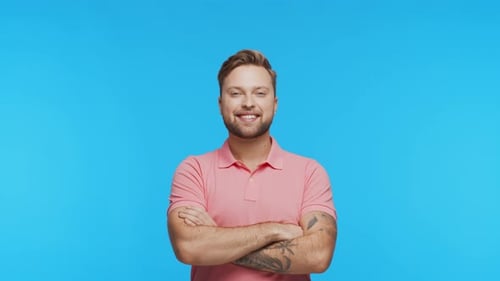 Expressive Young Man Over Vibrant Background Studio Portrait of Handsome Person