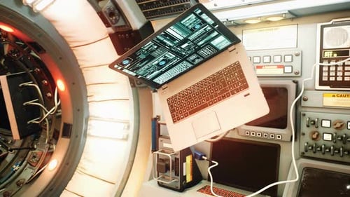 The floating laptop in weightlessness