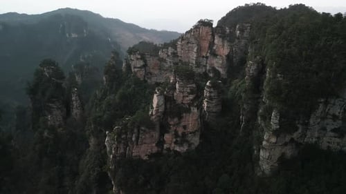 Aerial view of rock formations and forest, China.