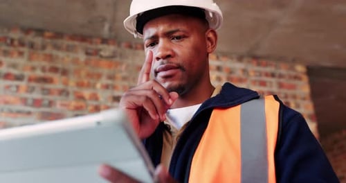 Tablet, black man and problem solving at construction site with engineering app