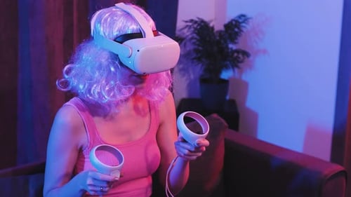 Woman Playing VR Game in a Home
