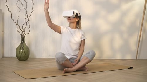Woman Using VR Headset for Virtual Reality Meditation