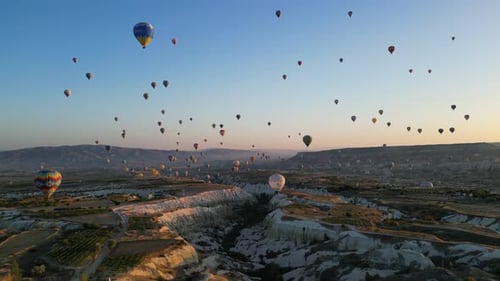 Aerial View of Hot Air Balloons at Sunrise