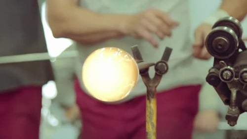 The handmade process of glassblowing, glass-making process, selective focus