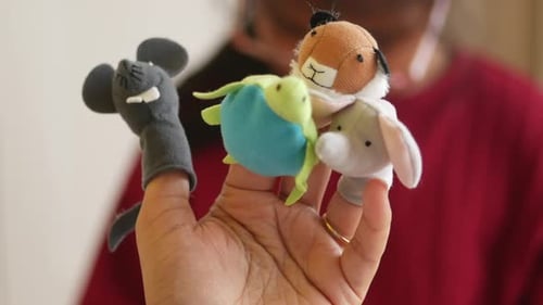 Hand Displaying Cute Animal Finger Puppets
