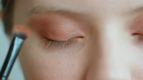 Makeup Artist Work in Her Beauty Studio Portrait of Woman Applying By Professional Make Up Master