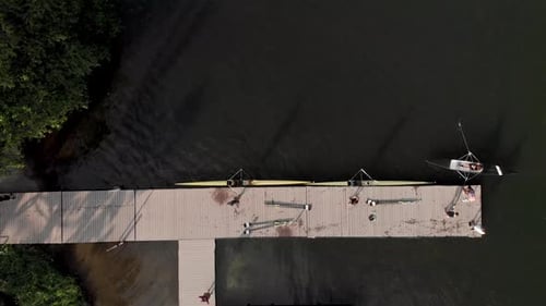 Aerial top down view of a rowing dock and training facility in the city lake of Rio de Janeiro with