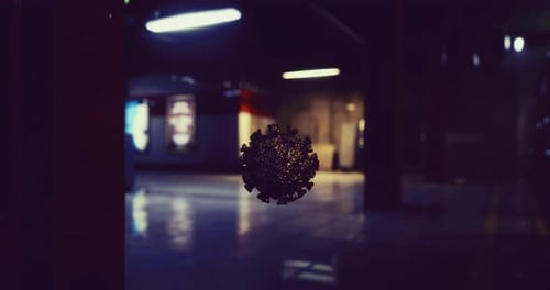 Virus Visualization Floating in a Dimly Lit Underground Station Corridor