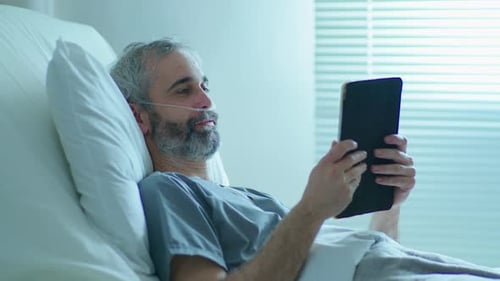 Patient Video Calling on Digital Tablet in Hospital Ward