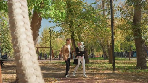 Couple Walking with Their Child Young Family Spending Peaceful Time in City Park Bright Autumn Day