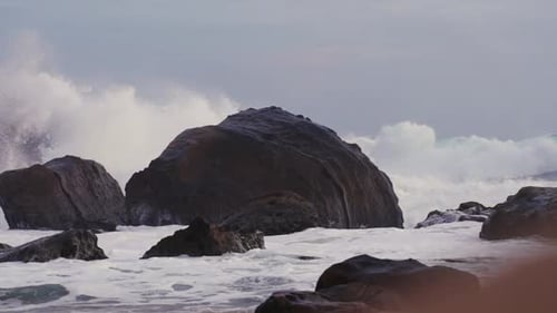 Ocean Fury on Rugged Rocks at Dusk