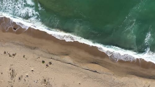 Flying Over Tropical Coast With Sea Waves Washing Sandy Beach. Aerial Drone View